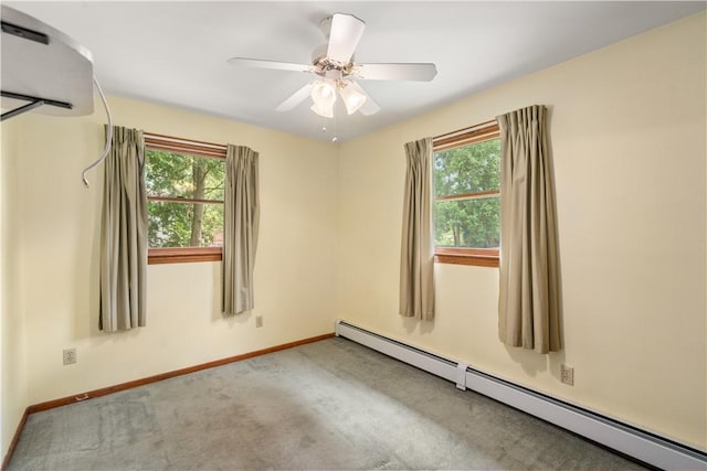 19 Cindy Ln, Coventry, RI 02816 - spare room featuring baseboard heating, baseboards, carpet flooring, and a ceiling fan