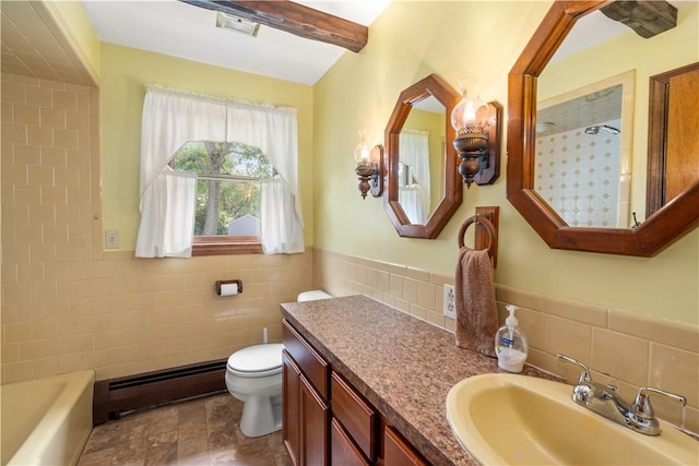 19 Cindy Ln, Coventry, RI 02816 - bathroom featuring baseboard heating, tile walls, toilet, a tub to relax in, and vanity