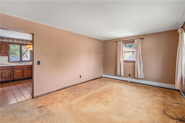 19 Cindy Ln, Coventry, RI 02816 - unfurnished room with light carpet, healthy amount of natural light, a sink, and baseboards