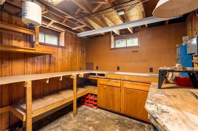 19 Cindy Ln, Coventry, RI 02816 - below grade area featuring a workshop area and wood walls