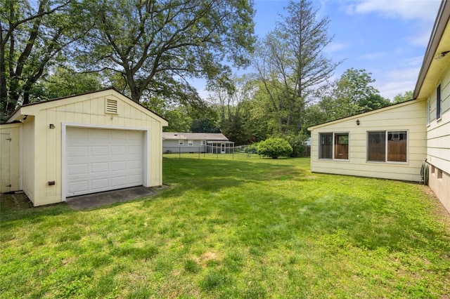 19 Cindy Ln, Coventry, RI 02816 - view of yard with an outdoor structure and a garage
