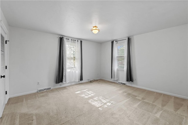 694 Windwood Dr Unit C, Tiverton, RI 02878 - unfurnished room with healthy amount of natural light, carpet, and baseboards
