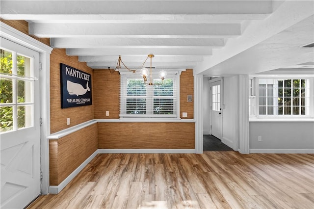 694 Windwood Dr Unit C, Tiverton, RI 02878 - unfurnished dining area featuring baseboards, a chandelier, healthy amount of natural light, and beamed ceiling