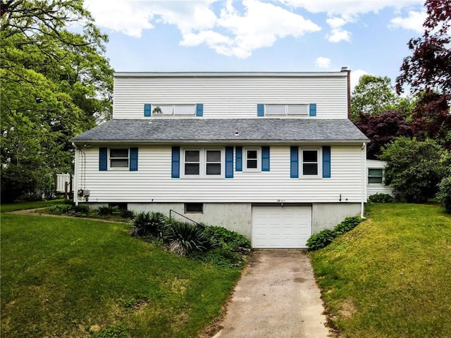 10 Joanth Ter, Westerly, RI 02891 - view of front facade with driveway, a garage, and a front yard