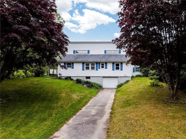 10 Joanth Ter, Westerly, RI 02891 - view of front of home featuring an attached garage, driveway, and a front lawn
