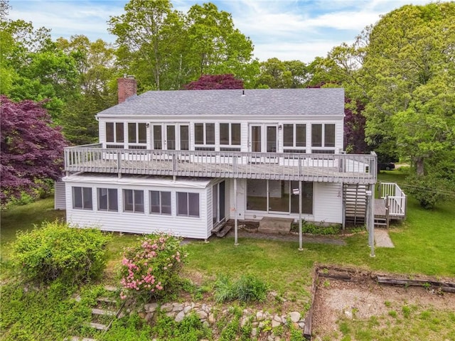10 Joanth Ter, Westerly, RI 02891 - rear view of property with a deck, a chimney, stairway, a lawn, and roof with shingles