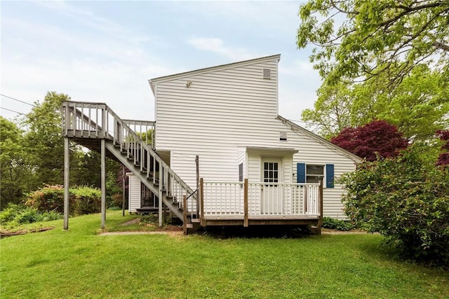 10 Joanth Ter, Westerly, RI 02891 - rear view of property featuring a deck, a lawn, and stairs