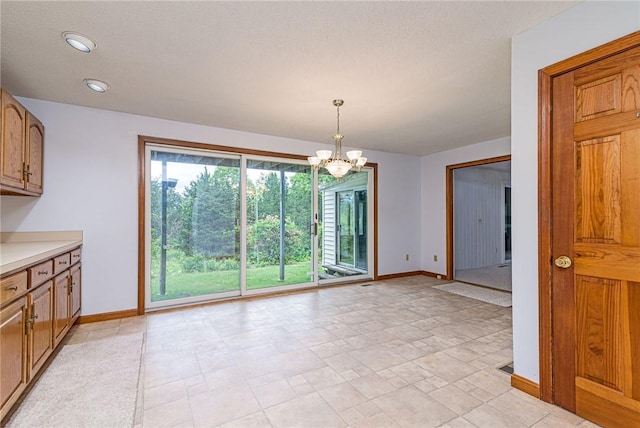 10 Joanth Ter, Westerly, RI 02891 - unfurnished dining area with baseboards, a chandelier, and recessed lighting