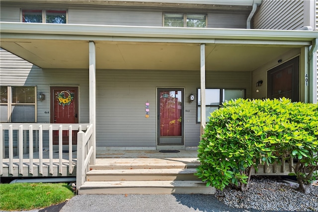 403 Pinewood Dr, Smithfield, RI 02917 - doorway to property featuring a porch