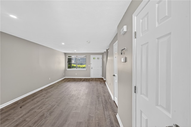 403 Pinewood Dr, Smithfield, RI 02917 - empty room featuring dark wood-style flooring, baseboards, and recessed lighting