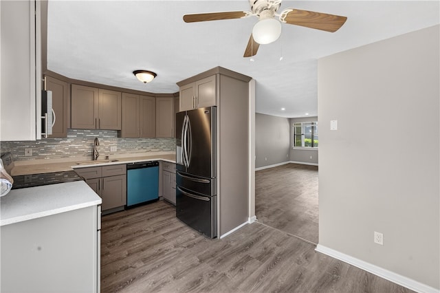 403 Pinewood Dr, Smithfield, RI 02917 - kitchen featuring dishwasher, stainless steel refrigerator with ice dispenser, a sink, tasteful backsplash, and baseboards