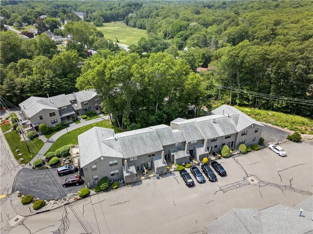 403 Pinewood Dr, Smithfield, RI 02917 - aerial perspective of suburban area with a heavily wooded area
