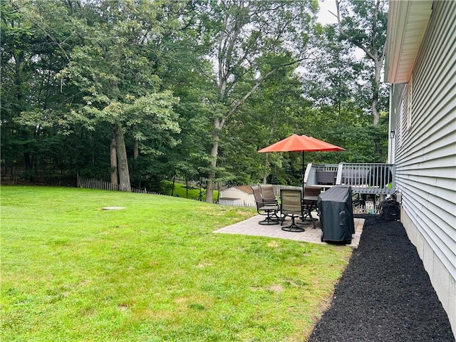 20 Canton Ct, Cranston, RI 02921 - view of green lawn with a patio, view of scattered trees, and outdoor dining area