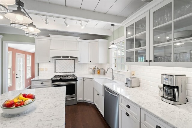 31 Peaceful Way, Tiverton, RI 02878 - kitchen with appliances with stainless steel finishes, a sink, dark wood finished floors, glass insert cabinets, and rail lighting