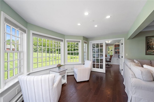 31 Peaceful Way, Tiverton, RI 02878 - sunroom with plenty of natural light, french doors, and a baseboard heating unit