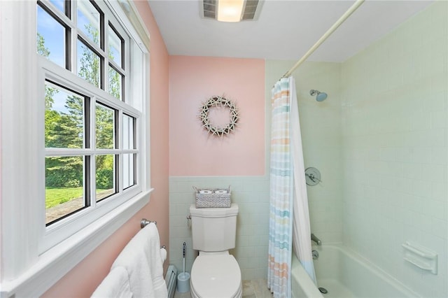 31 Peaceful Way, Tiverton, RI 02878 - bathroom with healthy amount of natural light, toilet, shower / bath combination with curtain, tile walls, and wainscoting
