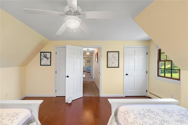 31 Peaceful Way, Tiverton, RI 02878 - bedroom featuring baseboard heating, wood finished floors, baseboards, ceiling fan, and lofted ceiling