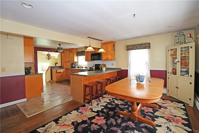 23 Sherman Ln, Middletown, RI 02842 - dining room featuring healthy amount of natural light, wood finished floors, recessed lighting, and ceiling fan