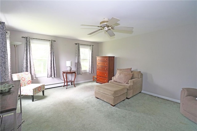 23 Sherman Ln, Middletown, RI 02842 - living area with carpet, healthy amount of natural light, baseboard heating, and a ceiling fan