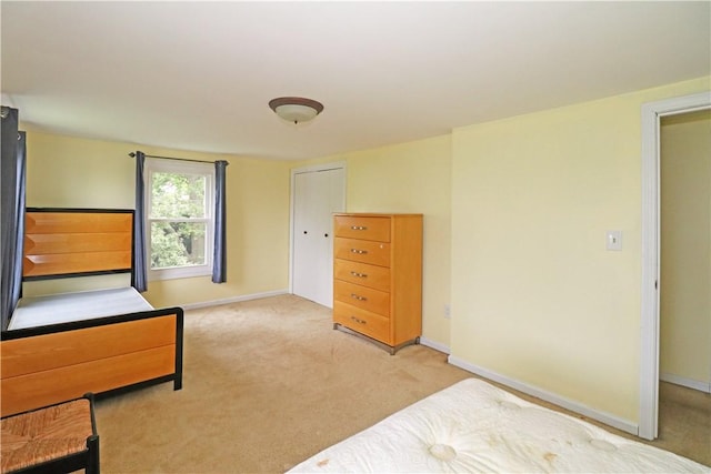 23 Sherman Ln, Middletown, RI 02842 - bedroom with light carpet and baseboards