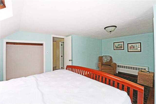 23 Sherman Ln, Middletown, RI 02842 - bedroom with radiator heating unit and lofted ceiling