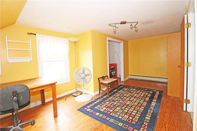 23 Sherman Ln, Middletown, RI 02842 - corridor featuring a baseboard radiator, wood finished floors, and an office area