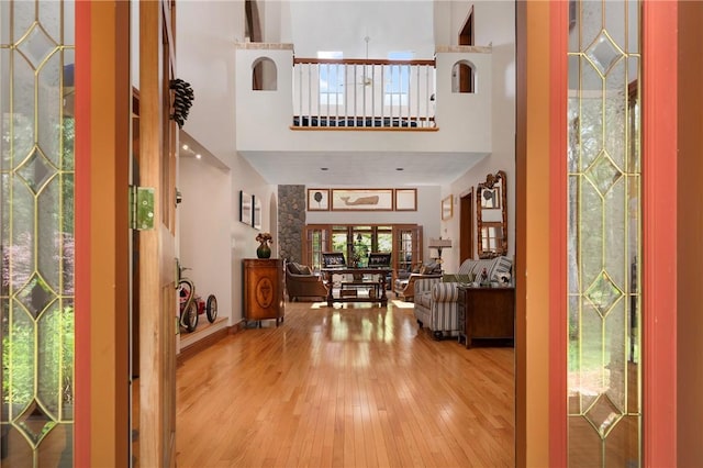 350 Austin Farm Rd, Exeter, RI 02822 - entryway featuring wood-type flooring and a towering ceiling