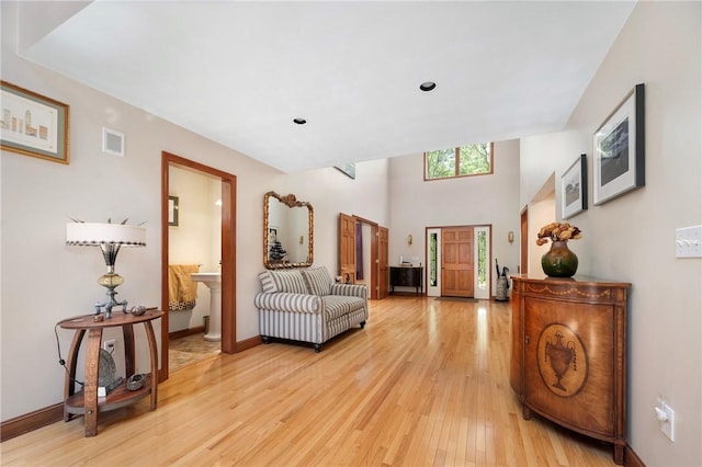 350 Austin Farm Rd, Exeter, RI 02822 - living area featuring light wood-style flooring and baseboards