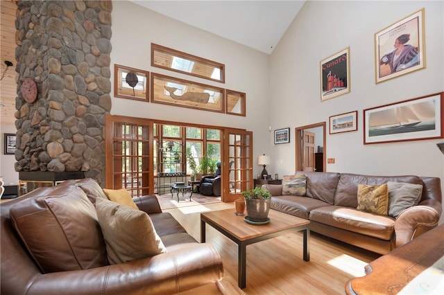 350 Austin Farm Rd, Exeter, RI 02822 - living room featuring high vaulted ceiling, wood finished floors, and french doors