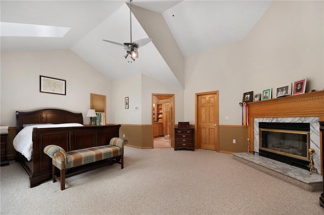 350 Austin Farm Rd, Exeter, RI 02822 - bedroom featuring light carpet, a premium fireplace, a skylight, baseboards, and high vaulted ceiling
