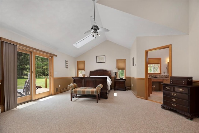 350 Austin Farm Rd, Exeter, RI 02822 - bedroom featuring access to outside, lofted ceiling, light colored carpet, a skylight, and wainscoting