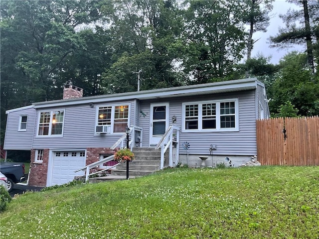 16 Bunny Trl, Scituate, RI 02831 - view of front of home featuring a garage, a chimney, driveway, and cooling unit