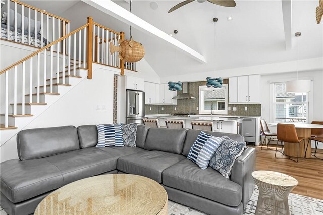 413 Atlantic Ave, Westerly, RI 02891 - living area with light wood-type flooring, a ceiling fan, and stairs