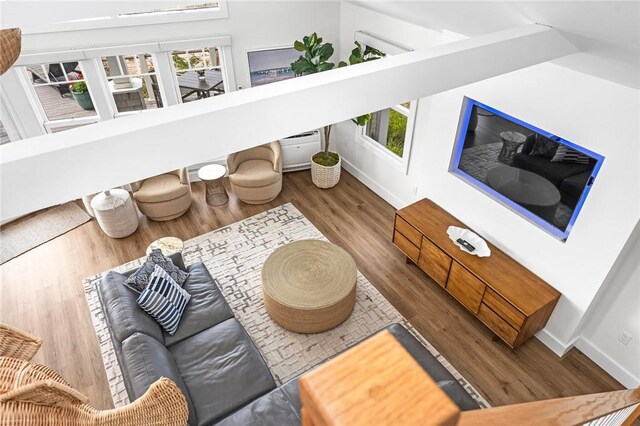 413 Atlantic Ave, Westerly, RI 02891 - living room with baseboards, plenty of natural light, and wood finished floors