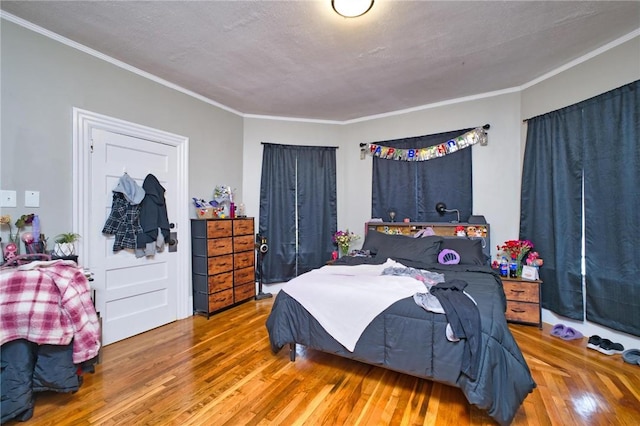 62 School St, Fall River, MA 02720 - bedroom with wood finished floors and crown molding