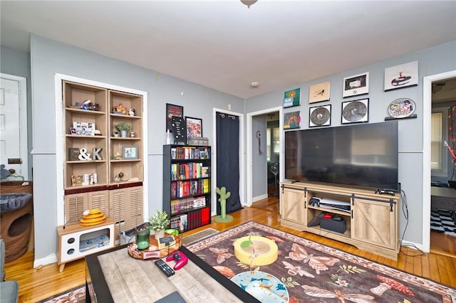62 School St, Fall River, MA 02720 - living room featuring wood finished floors and baseboards