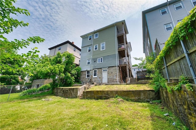 62 School St, Fall River, MA 02720 - rear view of property featuring stairway