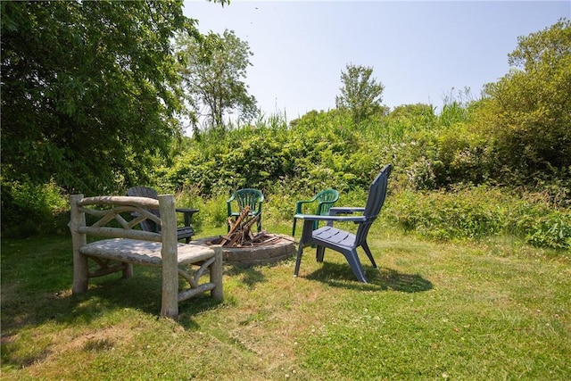 201 Paradise Ave, Middletown, RI 02842 - view of grassy yard with an outdoor fire pit