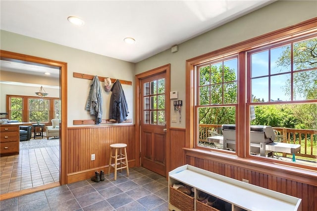 201 Paradise Ave, Middletown, RI 02842 - doorway featuring a wainscoted wall, recessed lighting, and wooden walls