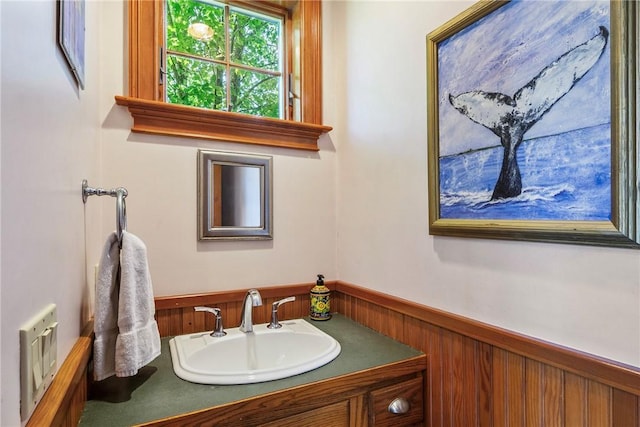 201 Paradise Ave, Middletown, RI 02842 - bathroom with vanity and a wainscoted wall