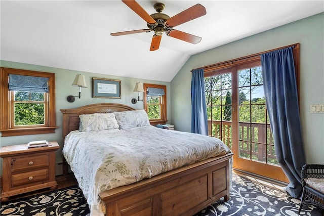 201 Paradise Ave, Middletown, RI 02842 - bedroom with vaulted ceiling, access to exterior, multiple windows, ceiling fan, and wood finished floors