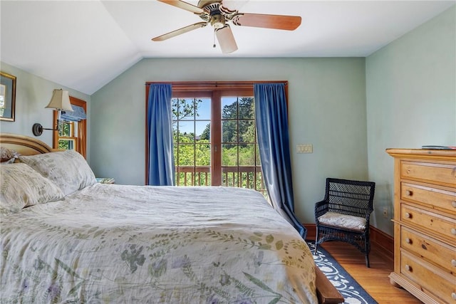 201 Paradise Ave, Middletown, RI 02842 - bedroom featuring access to outside, wood finished floors, lofted ceiling, a ceiling fan, and baseboards