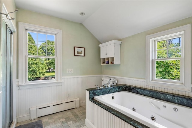 201 Paradise Ave, Middletown, RI 02842 - full bathroom featuring a baseboard radiator, a tub with jets, a wainscoted wall, a shower stall, and lofted ceiling