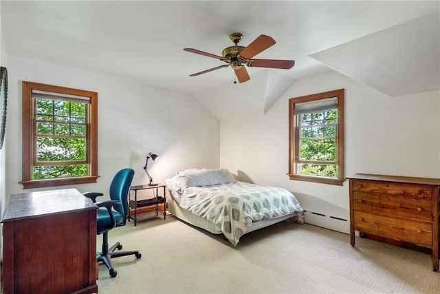 201 Paradise Ave, Middletown, RI 02842 - carpeted bedroom featuring a baseboard heating unit, multiple windows, vaulted ceiling, ceiling fan, and a desk