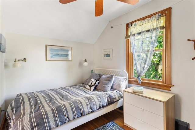 201 Paradise Ave, Middletown, RI 02842 - bedroom featuring multiple windows, vaulted ceiling, wood finished floors, and a ceiling fan