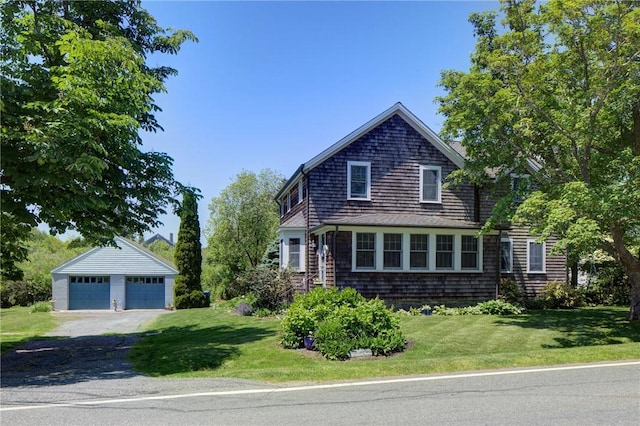 201 Paradise Ave, Middletown, RI 02842 - view of front facade with an outbuilding, a garage, and a front yard