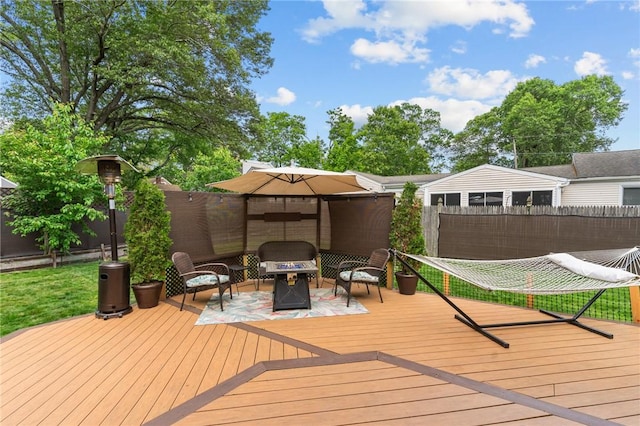 68 Everglade Ave, Warwick, RI 02886 - wooden terrace featuring a fire pit and grilling area