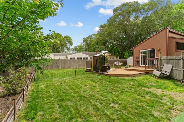 68 Everglade Ave, Warwick, RI 02886 - fenced backyard with a deck