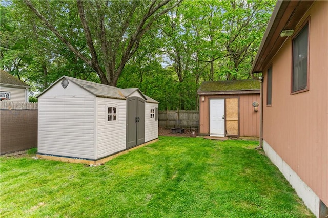 68 Everglade Ave, Warwick, RI 02886 - fenced backyard with a shed and view of wooded area