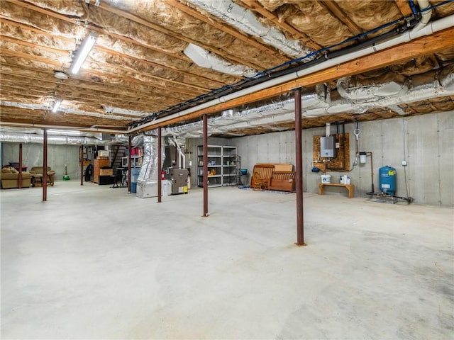 162 Pine Orchard Rd, Glocester, RI 02814 - unfinished below grade area featuring a water pressure tank and heating unit
